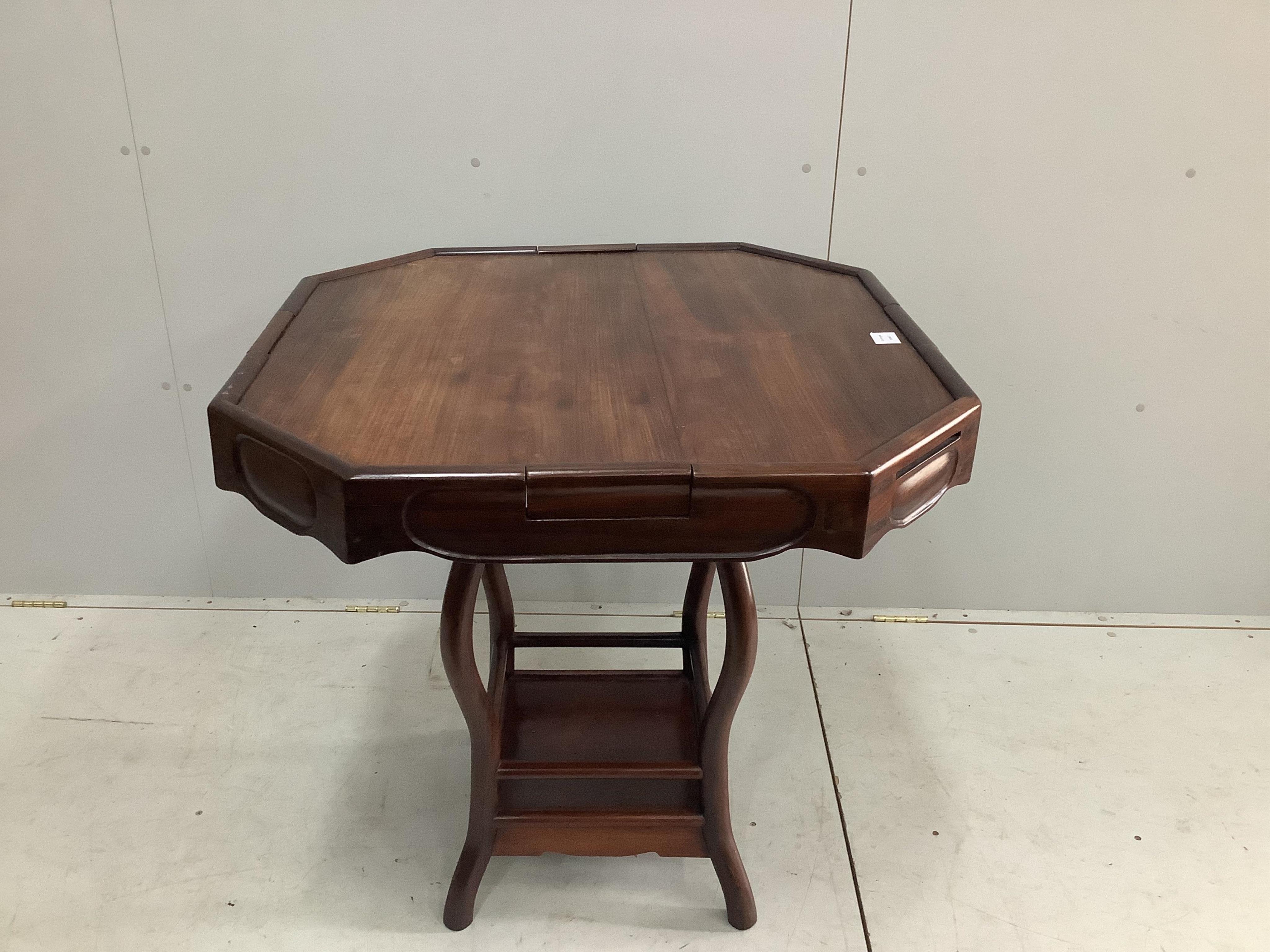 A Chinese octagonal padouk wood mah jong table, width 85cm, depth 84cm, height 82cm. Condition - fair